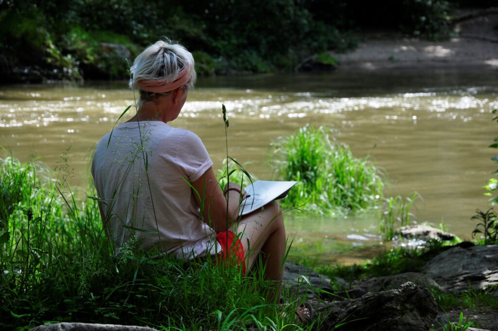 drawing with charcoal by the riverside during drawing holiday